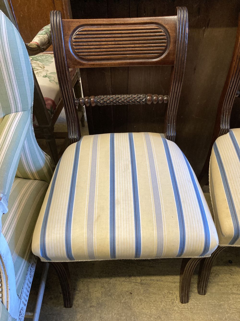 A set of four Regency mahogany dining chairs